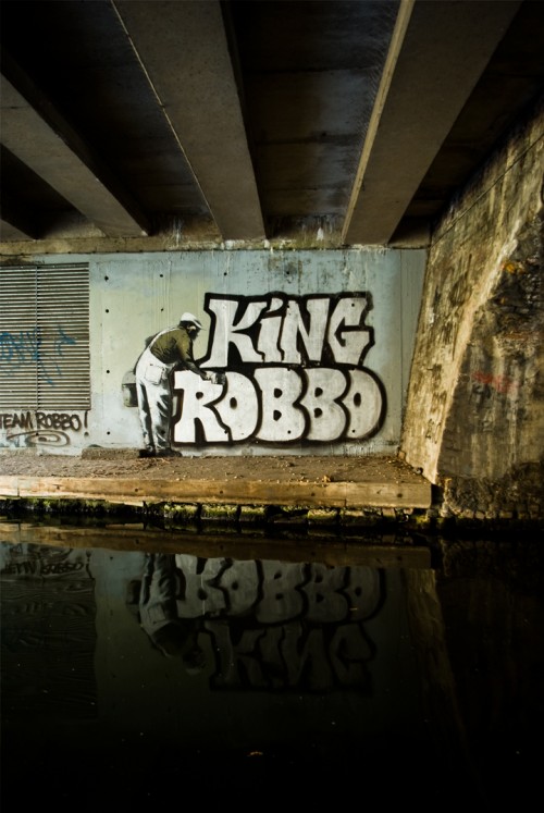 King Robbo covering Banksy in Camden Town, London