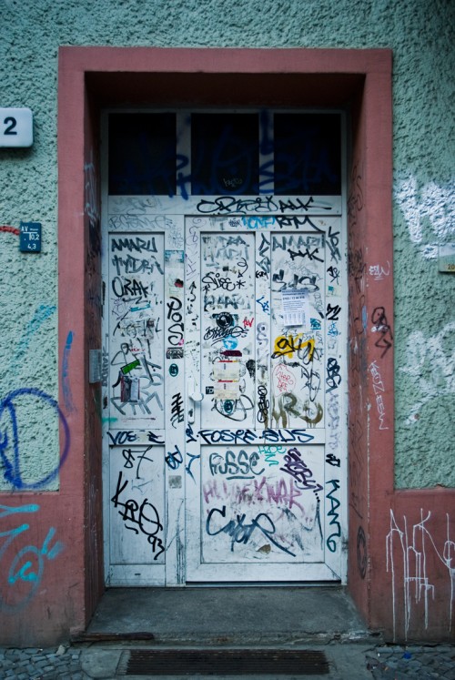 A heavily tagged door in Berlin, Germany